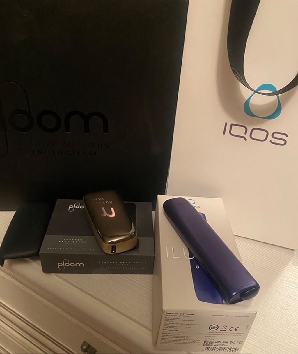 Iqos Iluma i və Ploom cihaz dəsti birlikde adaptorlari ustunde — Elektronik siqaretlər, Bakı