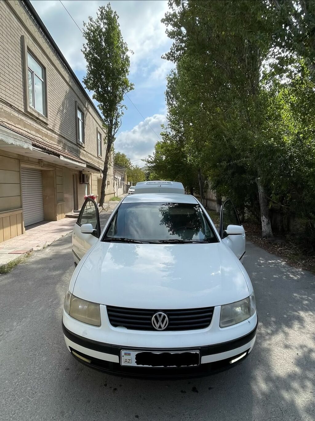 Volkswagen sedan salonu – bej və qara rəng kombinasiyalı, parça — Salon detalları, Bakı (5)
