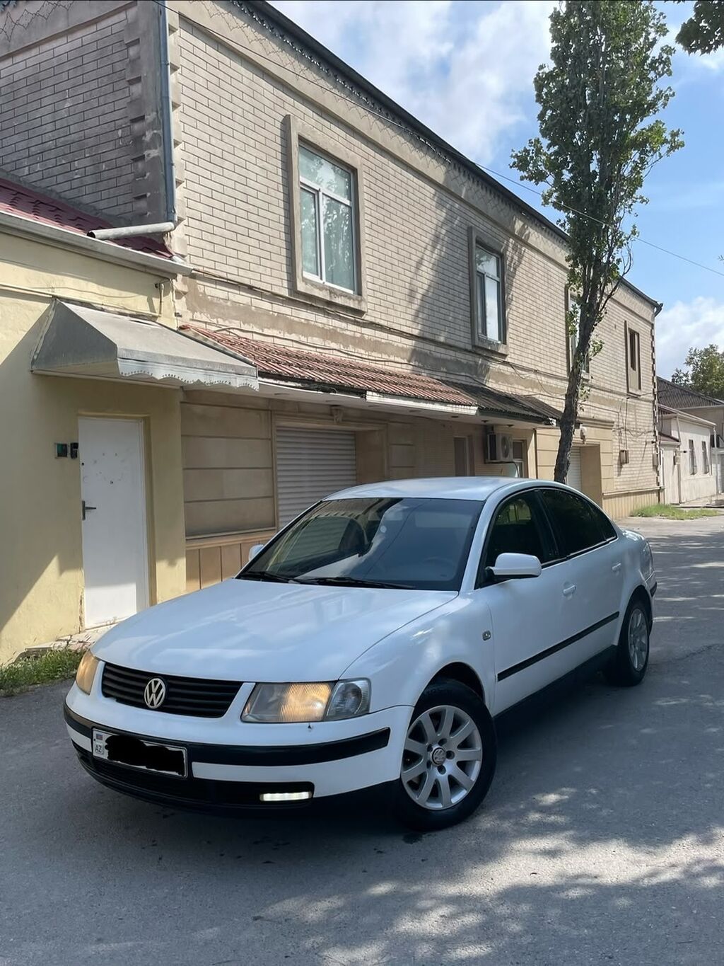 Volkswagen sedan salonu – bej və qara rəng kombinasiyalı, parça — Salon detalları, Bakı (9)