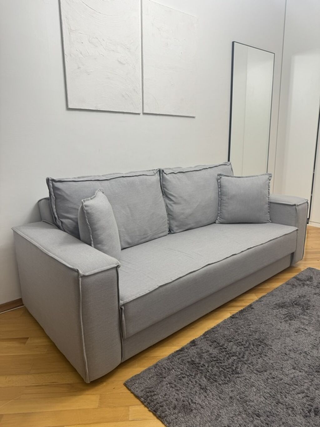 Boz rəngli divan Divanın uzunluğu 2 m, bazalıdır. Real alıcıya — Divanlər, Bakı