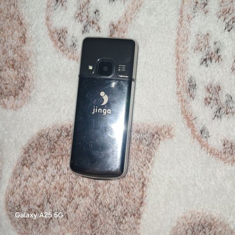 Jinga düyməli mobil telefon Xüsusiyyətlər: - İki SIM dəstəyi (ekranda — Mingəçevir