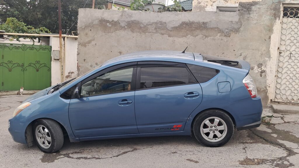 Toyota Prius (2-ci nəsil) – mavi rəngli hibrid liftbek. Texniki — Avtomobillər, Mehdiabad (2)