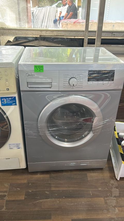 Midea paltaryuyan maşın, ön yükləməli model. Gümüşü rəngdə korpusa — Digah