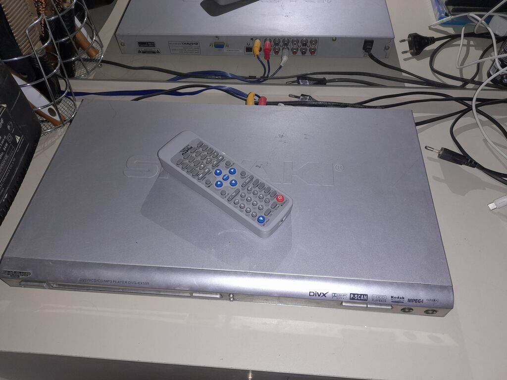 Saakı DVG-KX555 DVD/DivX pleyer + pult Xüsusiyyətlər: - Disk dəstəyi — DVD pleyer, Digah