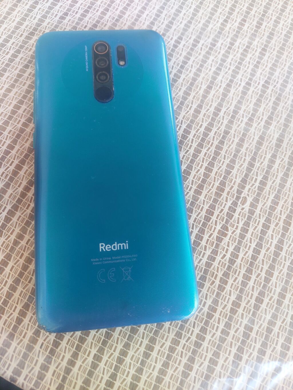 Redmi smartfon Model: Redmi (arxa qapaqda model kodu görünür — Xiaomi, Mingəçevir