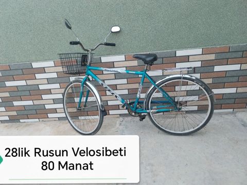 28-lik Rusun velosipedi Xüsusiyyətlər: - 28 ölçülü təkərlər — Saatlı