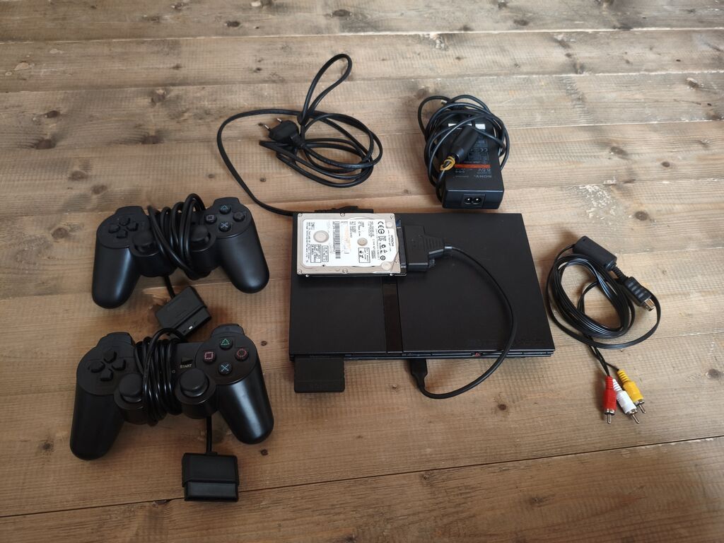 Playstation 2 prosivka içində playstation 2 və bir oyunları var — Oyun konsolları, Digah