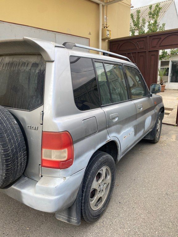 Mitsubishi Pajero io, 1.8 L, 1999 il, 247 694 km — Avtomobillər, Bakı (4)