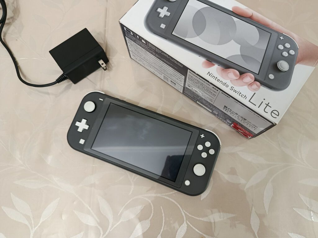 Nintendo Switch Lite yeni kimi vəziyyətdədir və çox səliqəli istifadə — Oyun konsolları, Bakı