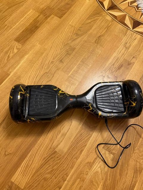 Elektrikli hoverboard (gyroskuter) - Rəng/naxış: Qara korpus üzərində — Bakı