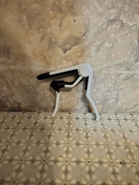 Məhsul: Alice Guitar Capo (A007D seriyası) + əlavə gitara teli (A5th — Bakı