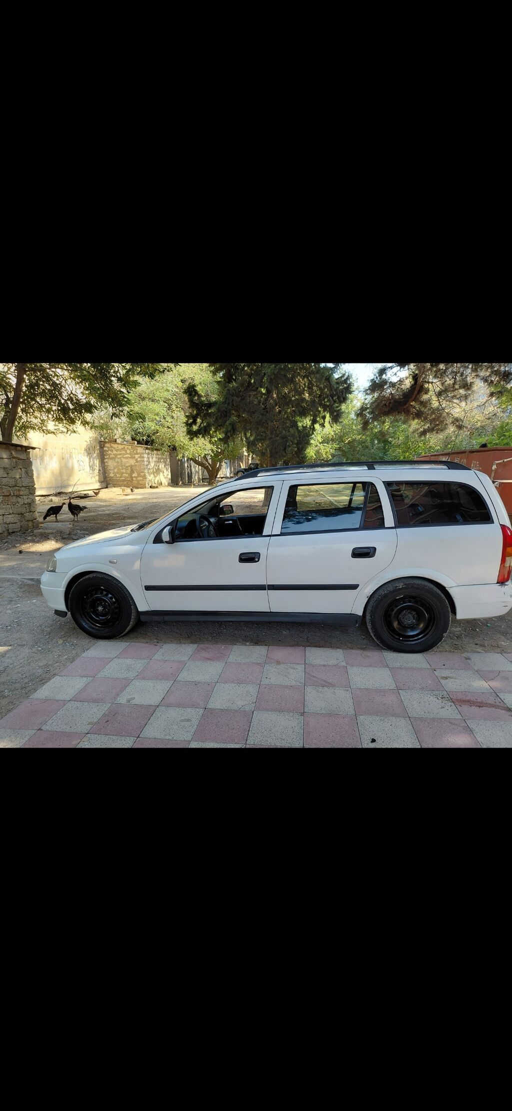 Opel Astra Universal – ağ rəng Xüsusiyyətlər: - Kuzov: universal 77-CM-759 — Avtomobillər, Bakı (3)