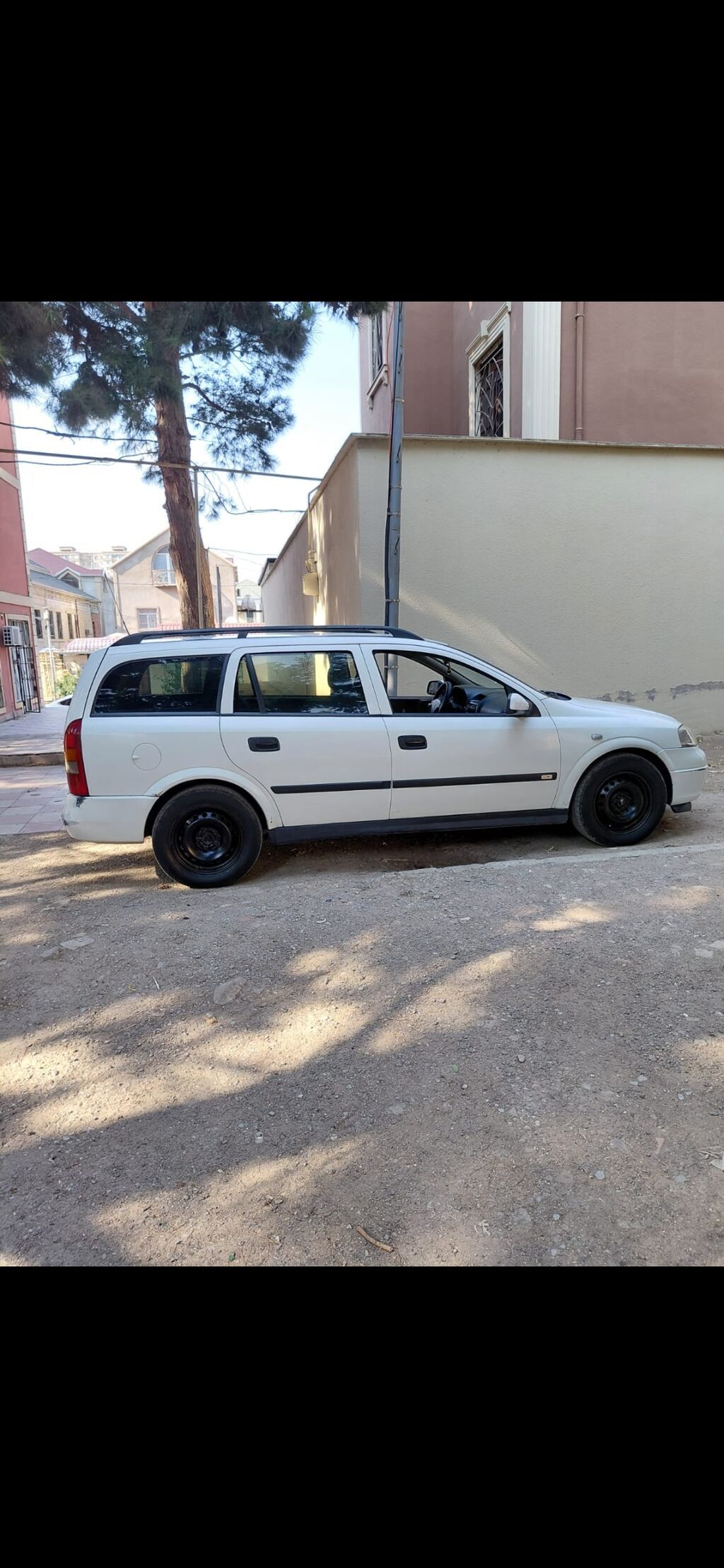 Opel Astra Universal – ağ rəng Xüsusiyyətlər: - Kuzov: universal 77-CM-759 — Avtomobillər, Bakı (4)