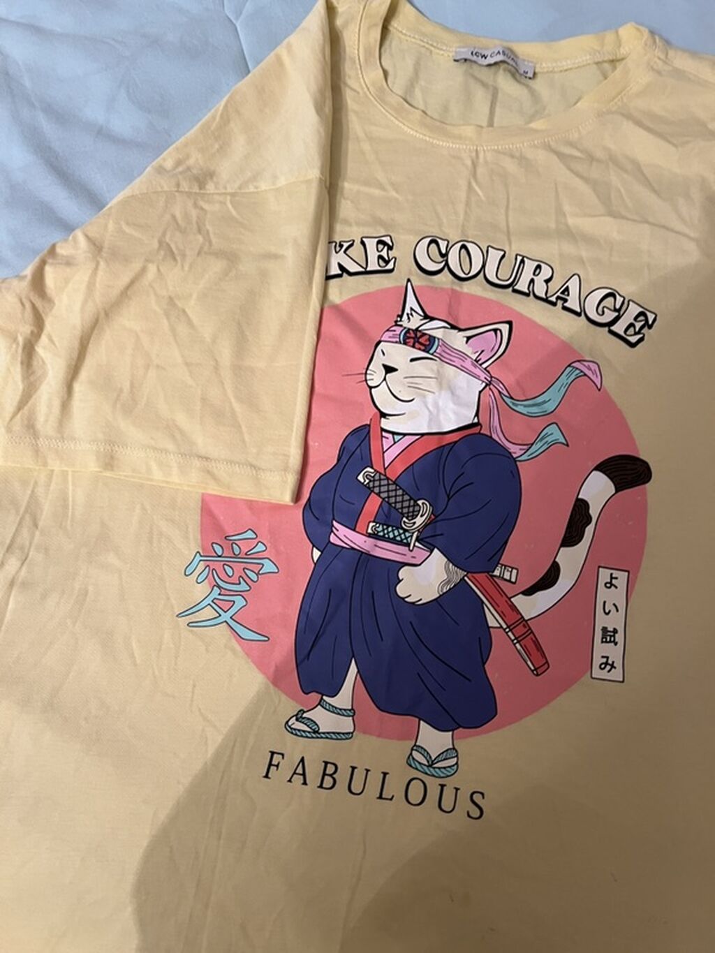 Qrafik çaplı T‑şört - Rəng: açıq sarı - Ön çap: “Take Courage” və — Futbolka və polo, Bakı (2)