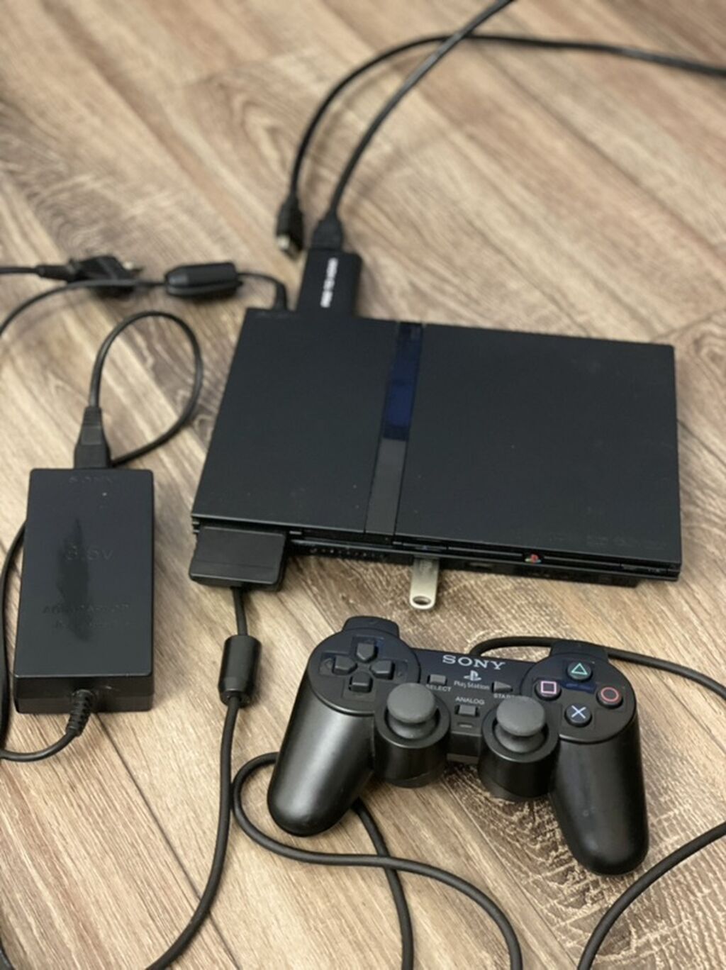 Sony PlayStation 2 Slim (Scph seriyası) oyun konsolu Paket tərkibi — Oyun konsolları, Bakı (2)