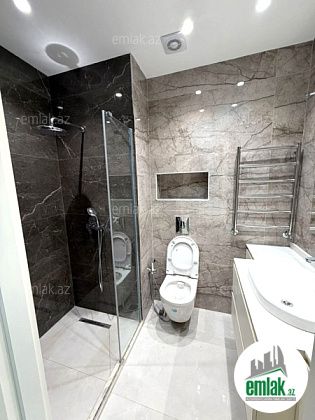 Satılır 3 otaqlı 106 m² yeni tikili Bakmil m — Mənzil (12)