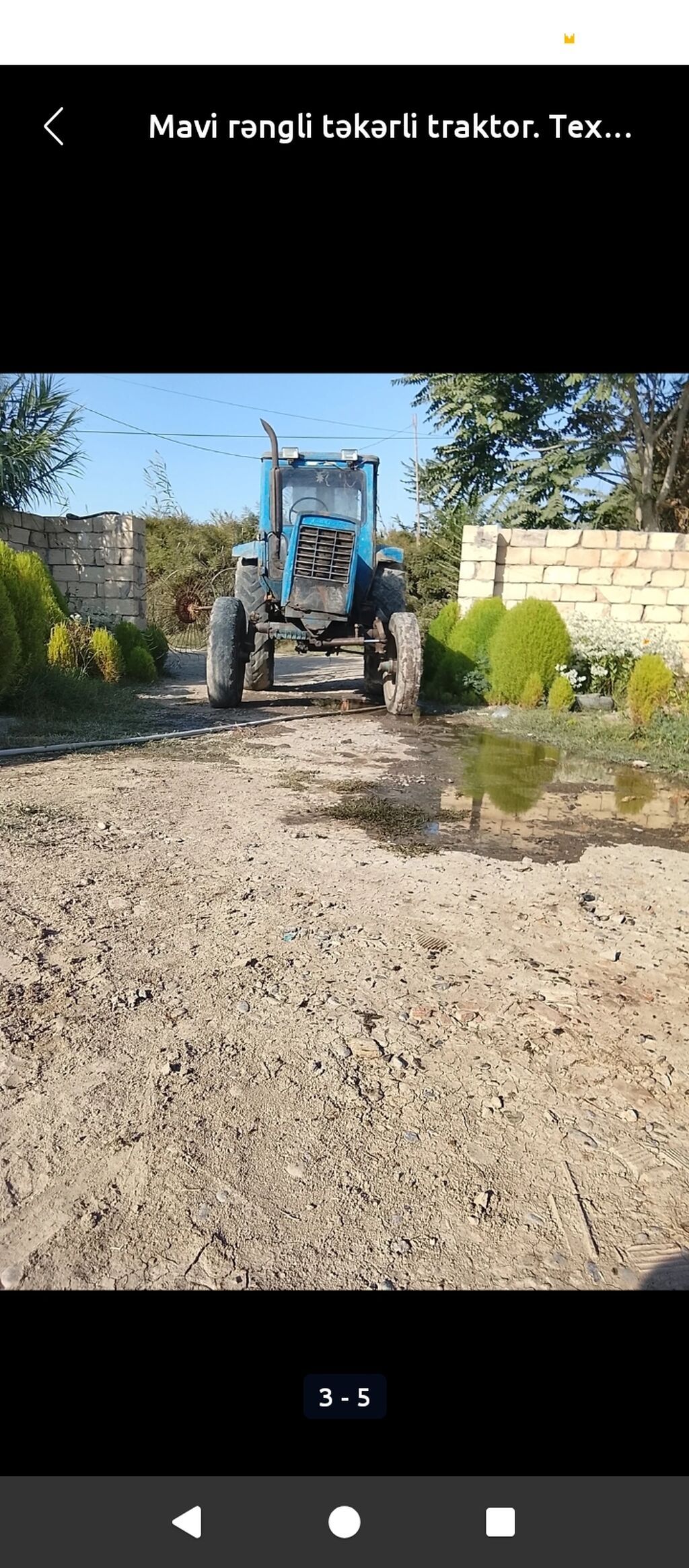 Mavi rəngli təkərli traktor - Korpus: kabinalı, ön radiator qəfəsi və — Traktorlar, Sabirabad (2)