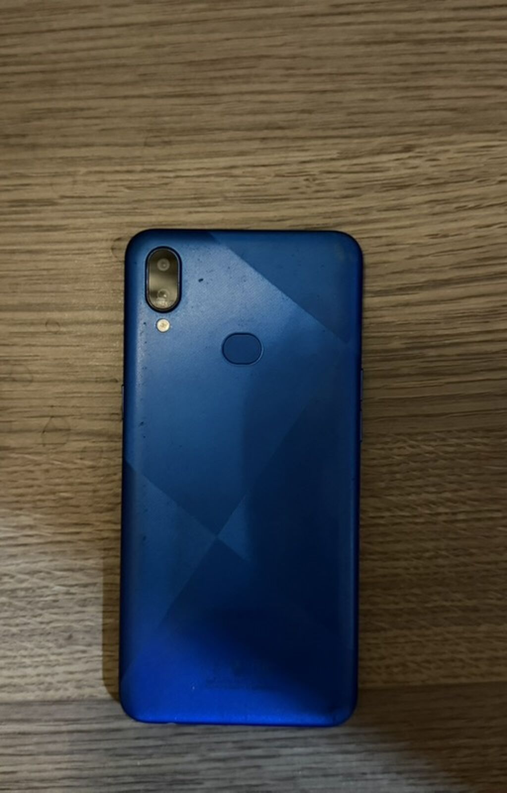 Mavi korpuslu smartfon Xüsusiyyətlər: - 6.x düymlük tam ekranlı ön — Digər smartfonlar, Bakı