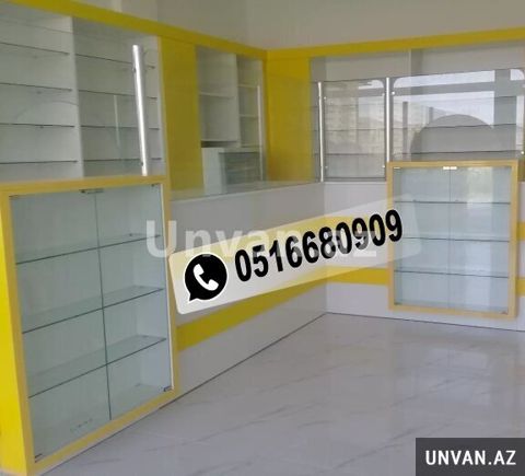 Aptek mebeli yığılması — Bakı