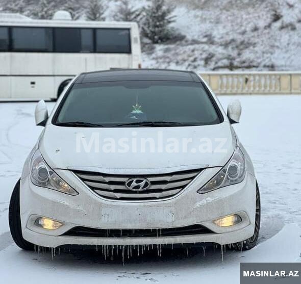 Kia Cerato, 2014 il — Minik avtomobili icarəsi, Bakı (2)
