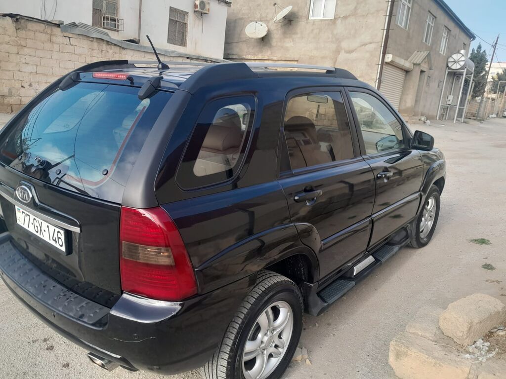 Kia Sportage – qara rəngli, şəhər və yolsuzluq üçün əlverişli kompakt 77-GX-146 — Avtomobillər, Bakı (7)