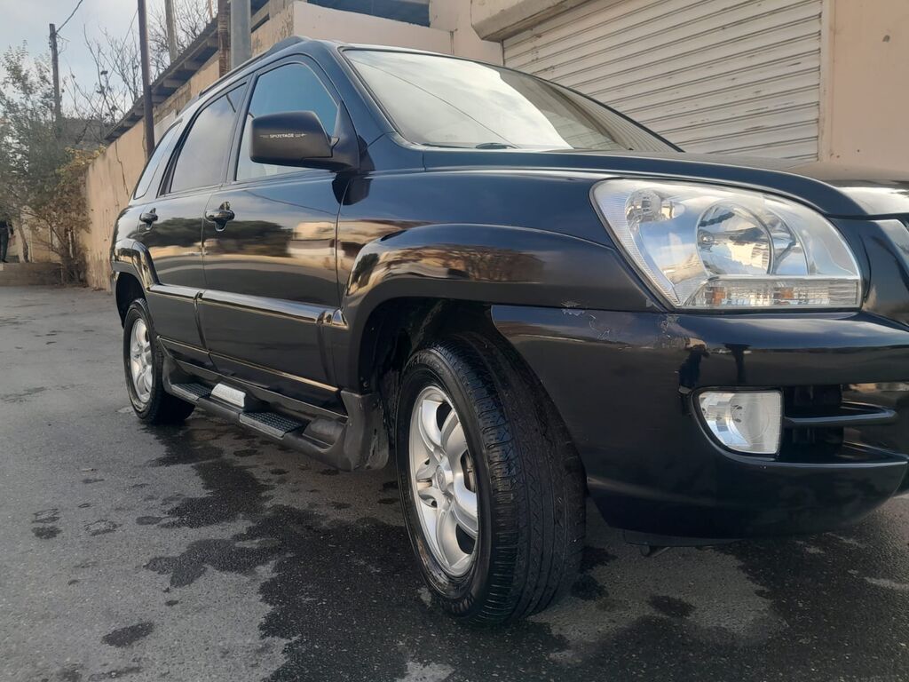 Kia Sportage – qara rəngli, şəhər və yolsuzluq üçün əlverişli kompakt 77-GX-146 — Avtomobillər, Bakı (6)
