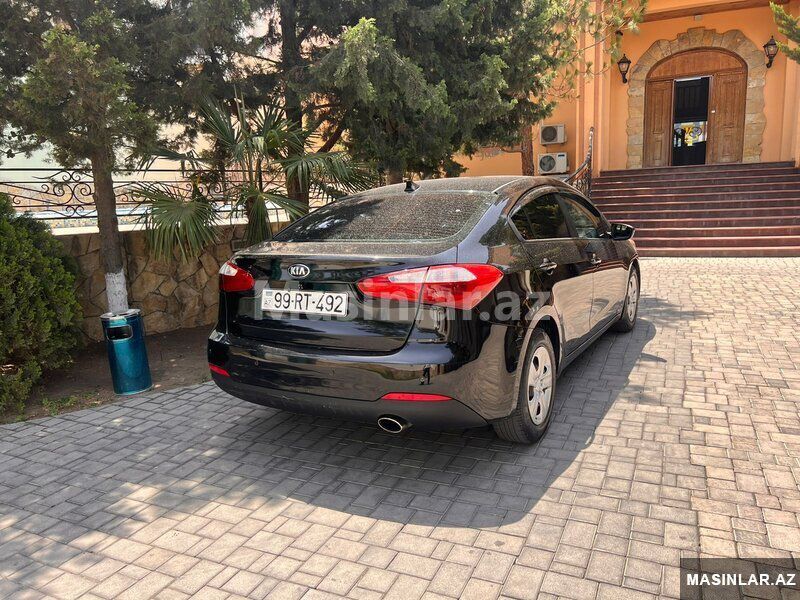 Kia Cerato, 2014 il 99-RT-492 — Minik avtomobili icarəsi, Bakı (2)