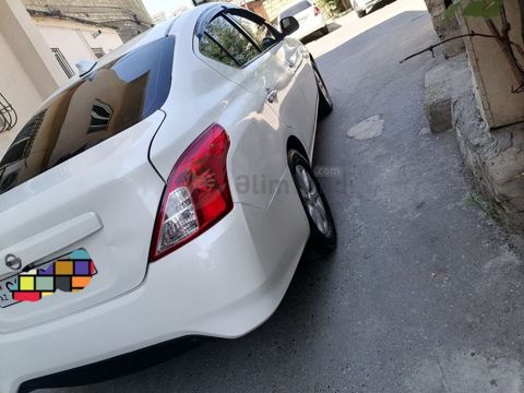 Nissan Sunny: 1.5 l 2013 il Sedan — Bakı