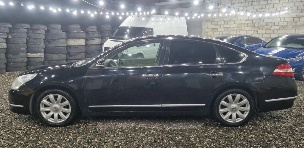 Nissan Teana – biznes sinfi sedan Xüsusiyyətlər: - Korpus: qara rəng — Avtomobillər, Digah (5)