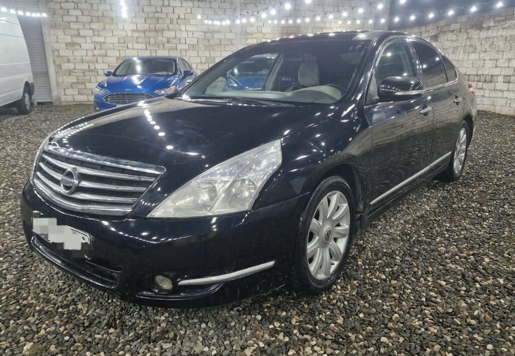 Nissan Teana – biznes sinfi sedan Xüsusiyyətlər: - Korpus: qara rəng — Avtomobillər, Digah (3)