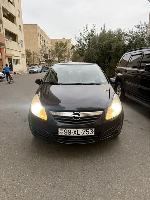 Opel Corsa D, hetçbek kuzov, 5 qapı, qara rəng. Əsas xüsusiyyətlər — Masazır