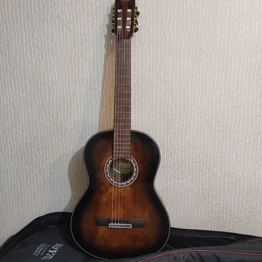 Klassik gitara, Yeni, Ünvandan götürmə — Gitarlar və digər simli alətlər, Masazır