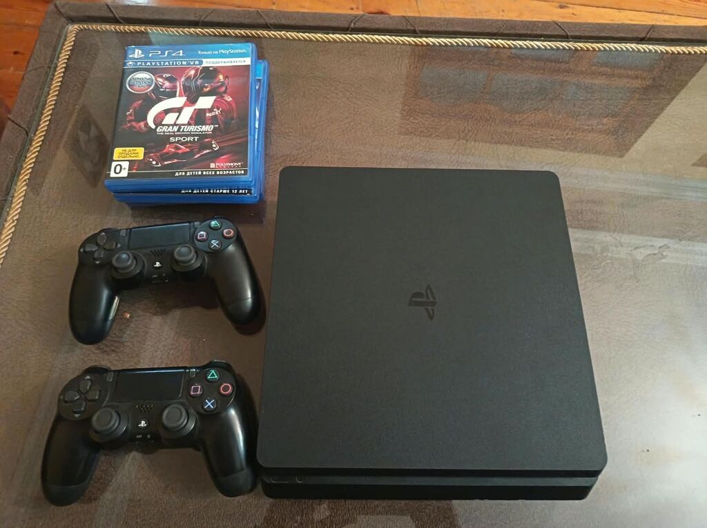 PlayStation 4 Slim komplekti Tərkib:1tl - PS4 Slim konsolu (qara — Oyun konsolları, Bakı