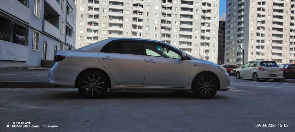 Toyota Corolla sedan - Kuzov: gümüşü rəng, 4 qapı - Nömrə: 77-HF-471 — Avtomobillər, Saray (5)