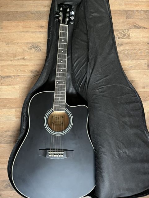 Açıqlı qara akustik gitara – QTE brendi - Korpus: dreadnought ölçü — 150 ₼ · Masazır · Gitarlar və digər simli alətlər Açıqlı qara akustik gitara – QTE brendi - Korpus: dreadnought ölçü — Masazır