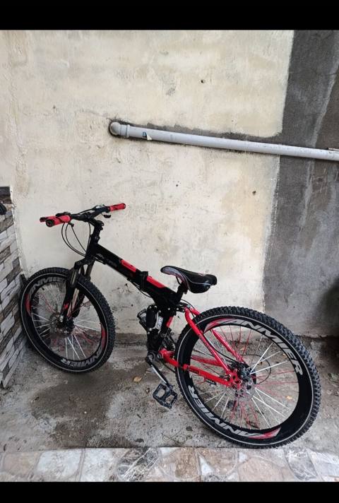 Dağ velosipedi – qatlana bilən, tam asqılı - Rəng: qara-qırmızı — 180 ₼ · Digah · Dağ velosipedləri Dağ velosipedi – qatlana bilən, tam asqılı - Rəng: qara-qırmızı — Digah