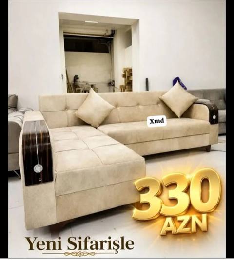 L formalı yumşaq künc divanı. Bej rəngdə zərif dizayna malikdir və — Baku
