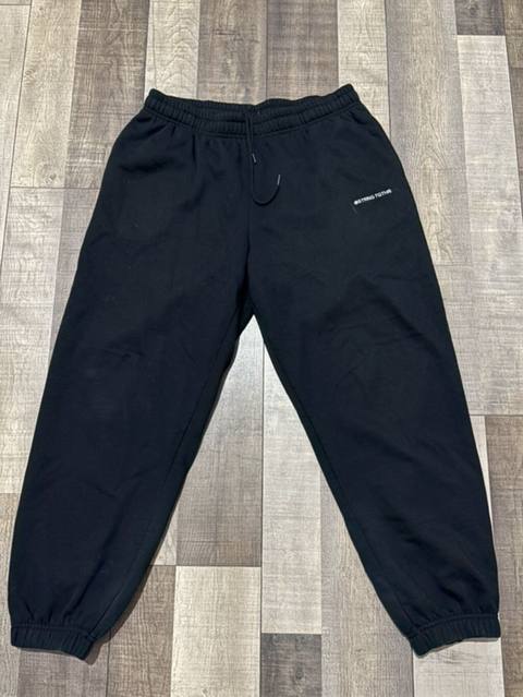 Qara rəngli unisex idman şalvarı - Model: jogger tipli, yığma balaq — Masazir
