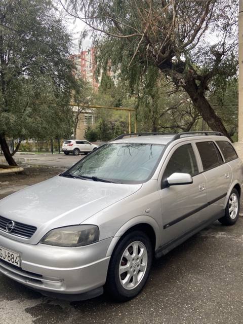 Opel Astra Caravan (universal) – gümüşü rəng Xüsusiyyətlər: - Kuzov — 8 800 ₼ · Sumgayit · Avtomobillər Opel Astra Caravan (universal) – gümüşü rəng Xüsusiyyətlər: - Kuzov — Sumgayit