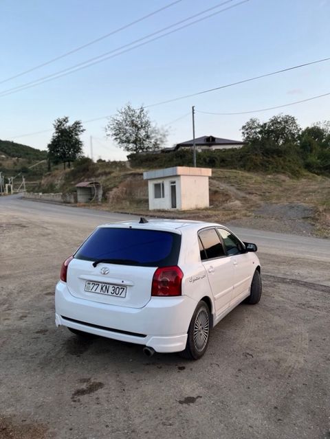 Toyota Corolla: 1.4 l | 2006 il Hetçbek
