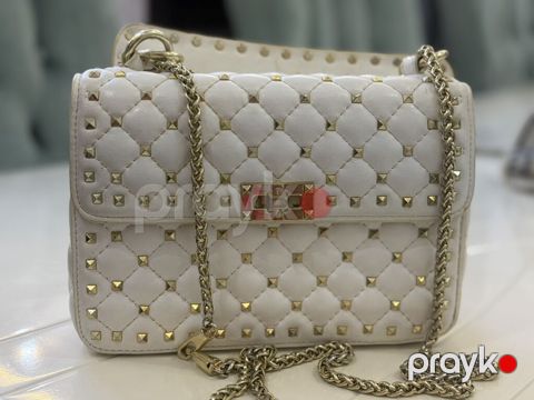 Çiyin çantası, Valentino, İşlənmiş