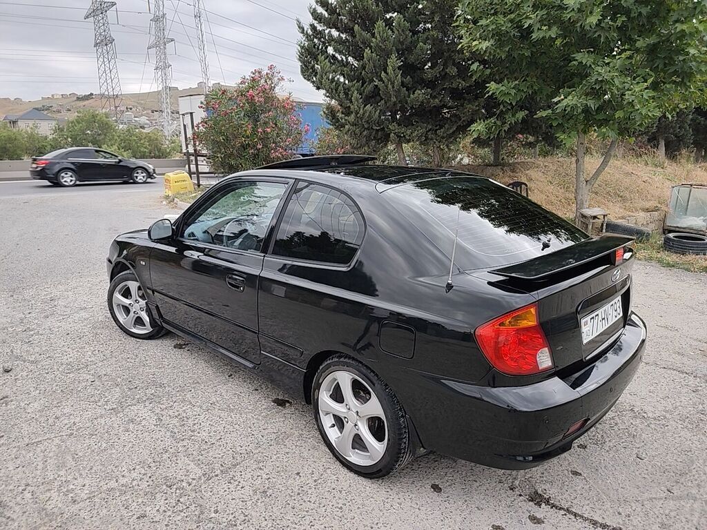 Hyundai Accent: 1.6 l | 2005 il Kupe
