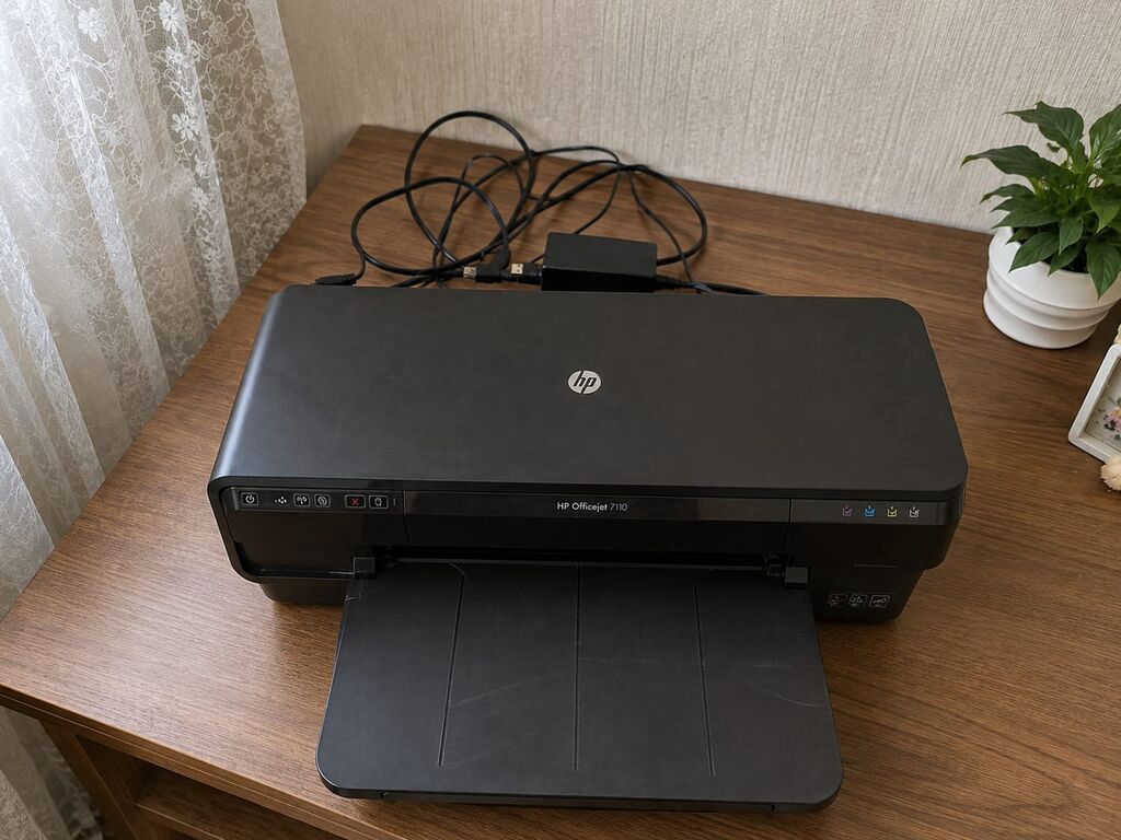 Printer HP Officejet 7110 modelidir. Ev və ofis istifadəsi üçün çox