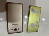 İki ədəd mobil telefon dəsti. 1) Samsung DUOS (ağ/gözəl qızılı arxa — Elektronika