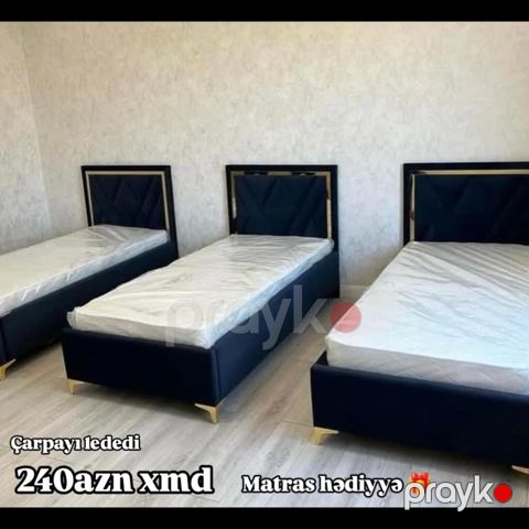 Tək nəfərlik çarpayı – zərif dizaynlı, yumşaq başlıqla. Qara/mavi — Bakı
