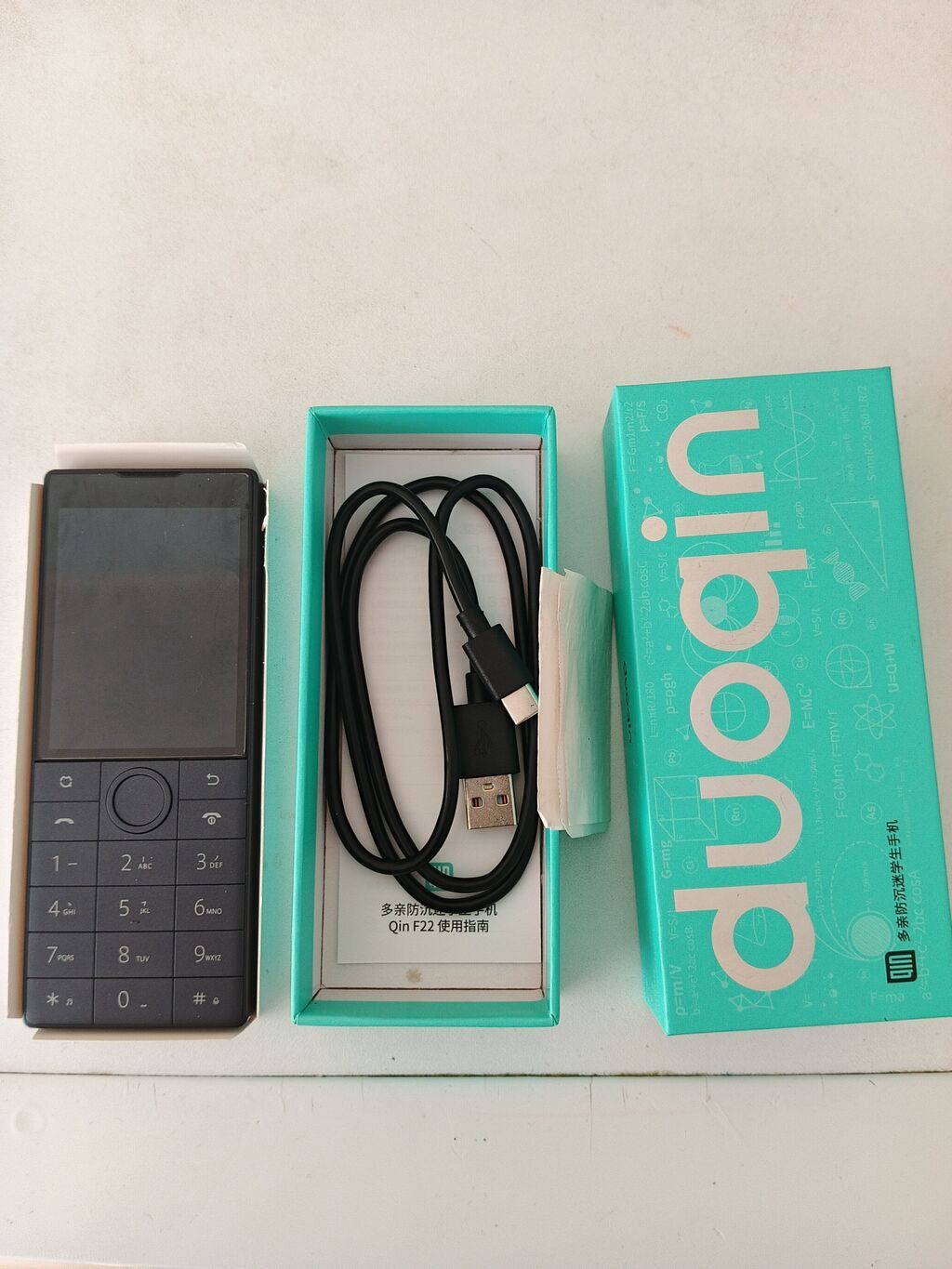 Duoqin Qin F22 düyməli mobil telefon, yeni kimi