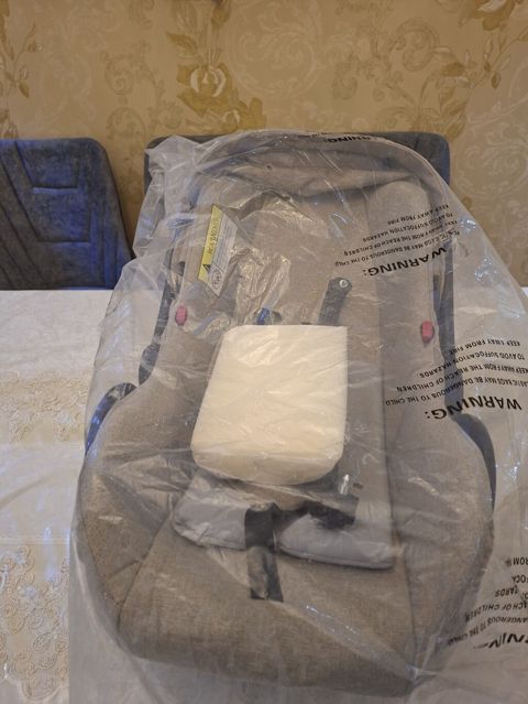 Uşaq avtomobil oturacağı - 0+ qrupu (yeni doğulmuş)