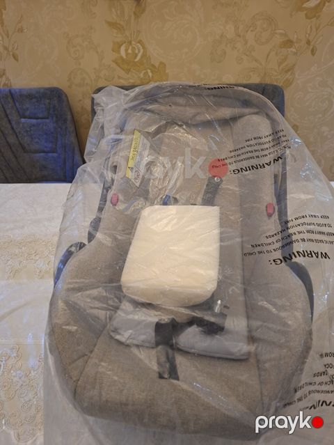 Uşaq avtomobil oturacağı - 0+ qrupu (yeni doğulmuş)
