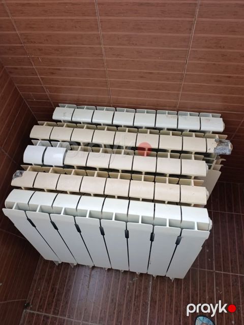 Radiator 41 seksiya 4azn bir seksiya Qaracuxur 1414 leliAlüminium