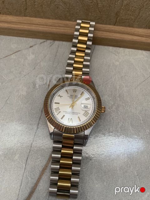 Salam rolex markasindan olan qol saati satiram, az islenib tezeden
